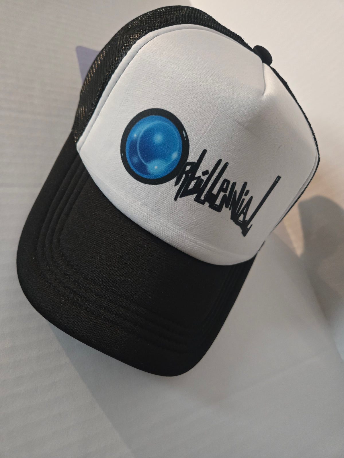 Orbillennial mesh trucker hat