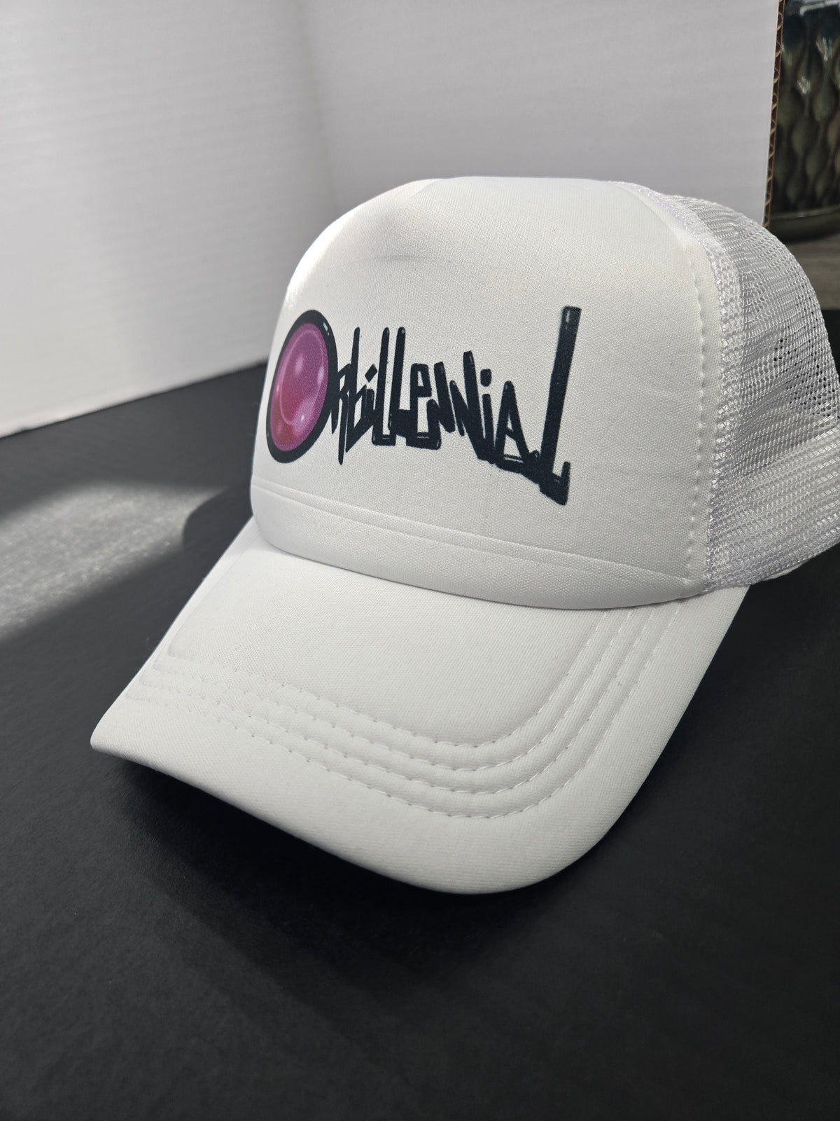 Orbillennial mesh trucker hat