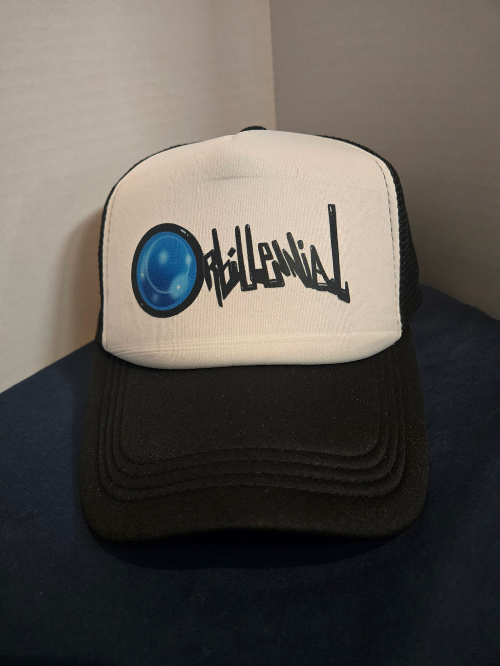 Orbillennial mesh trucker hat